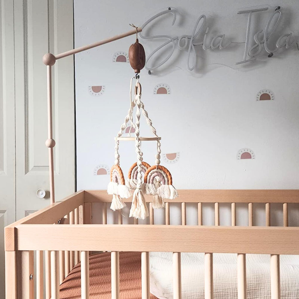 Lanttoe crib mobile attaches to crib arms for secure placement