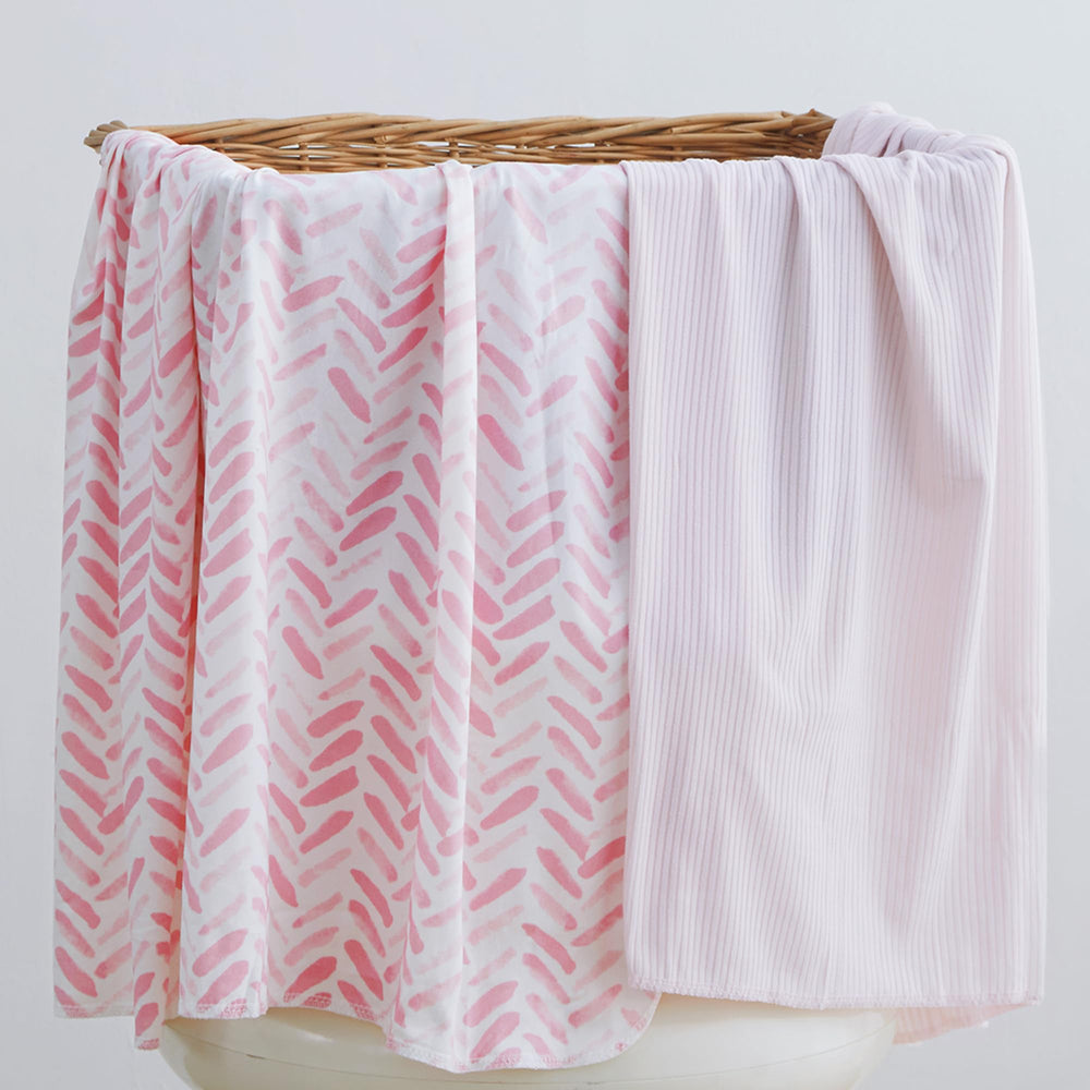 lasoftan burp cloth use for quick cleanup after feeds.