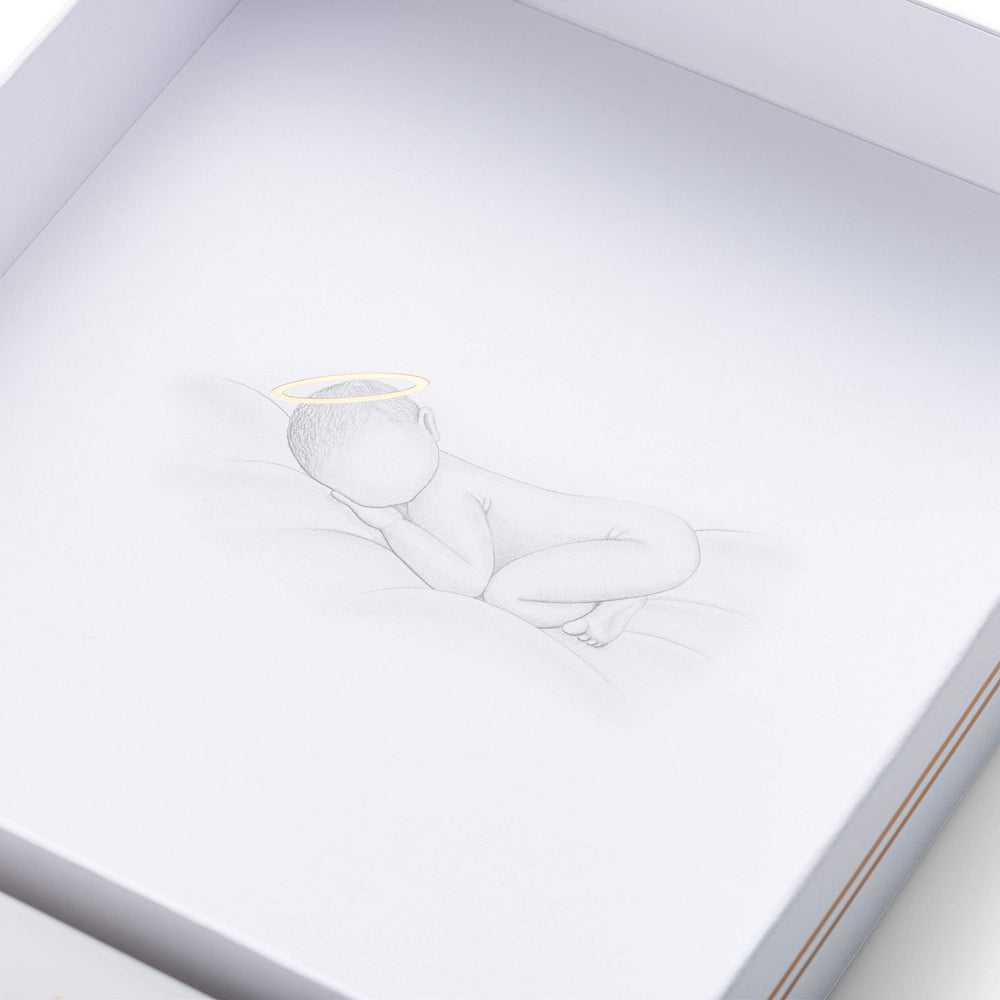 Lassos Boutique premium keepsake box with white linen and gold foil highlights premium gift quality