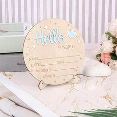 Lasuroa baby announcement board stands showcased on a dresser for easy display.