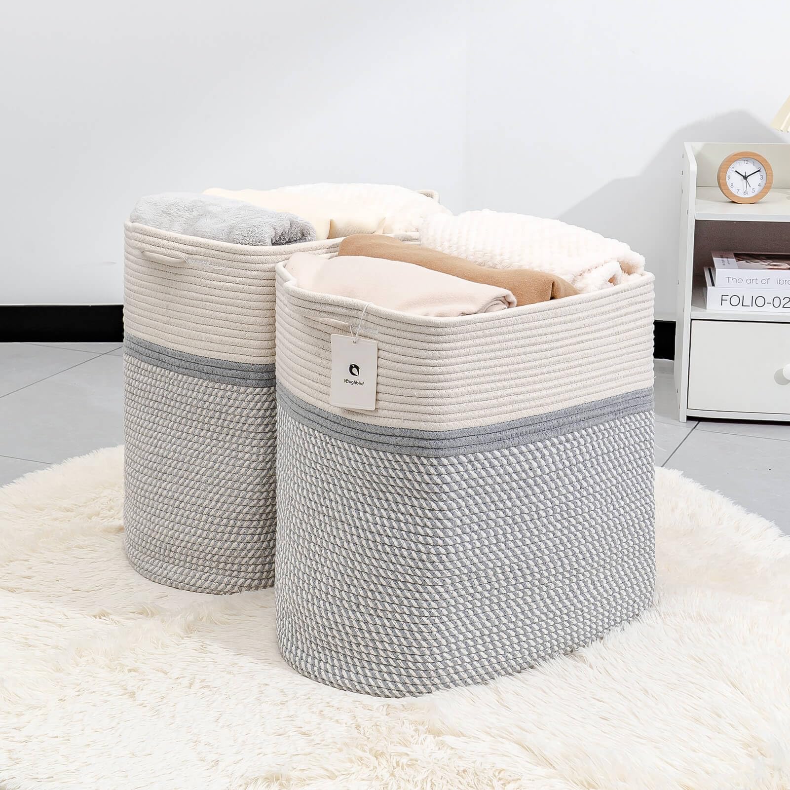 Laughbird storage baskets with handles shows easy-carry design for closet and living room.