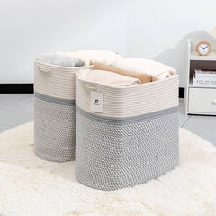 Laughbird storage baskets with handles shows easy-carry design for closet and living room.