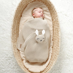 LAWKUL Bunny Lovey Blanket laid out for sleep training shows generous 40x30 inch size.