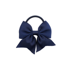 LDDCX navy blue bow closeup shows durable hot glued bow and elastic tie for staying power.