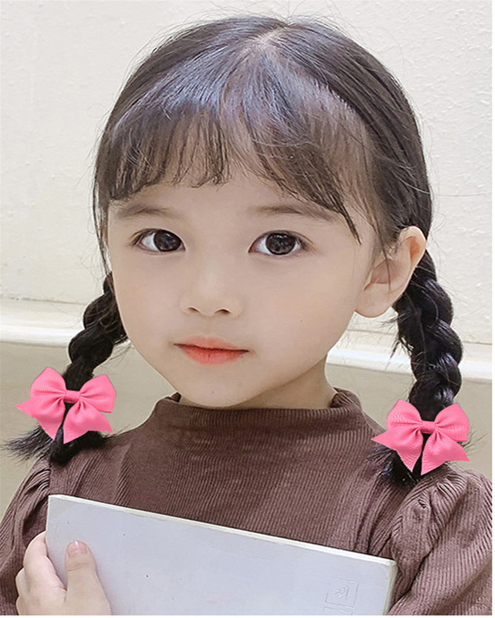 LDDCX styling ideas with bows hair ties on toddler ponytails
