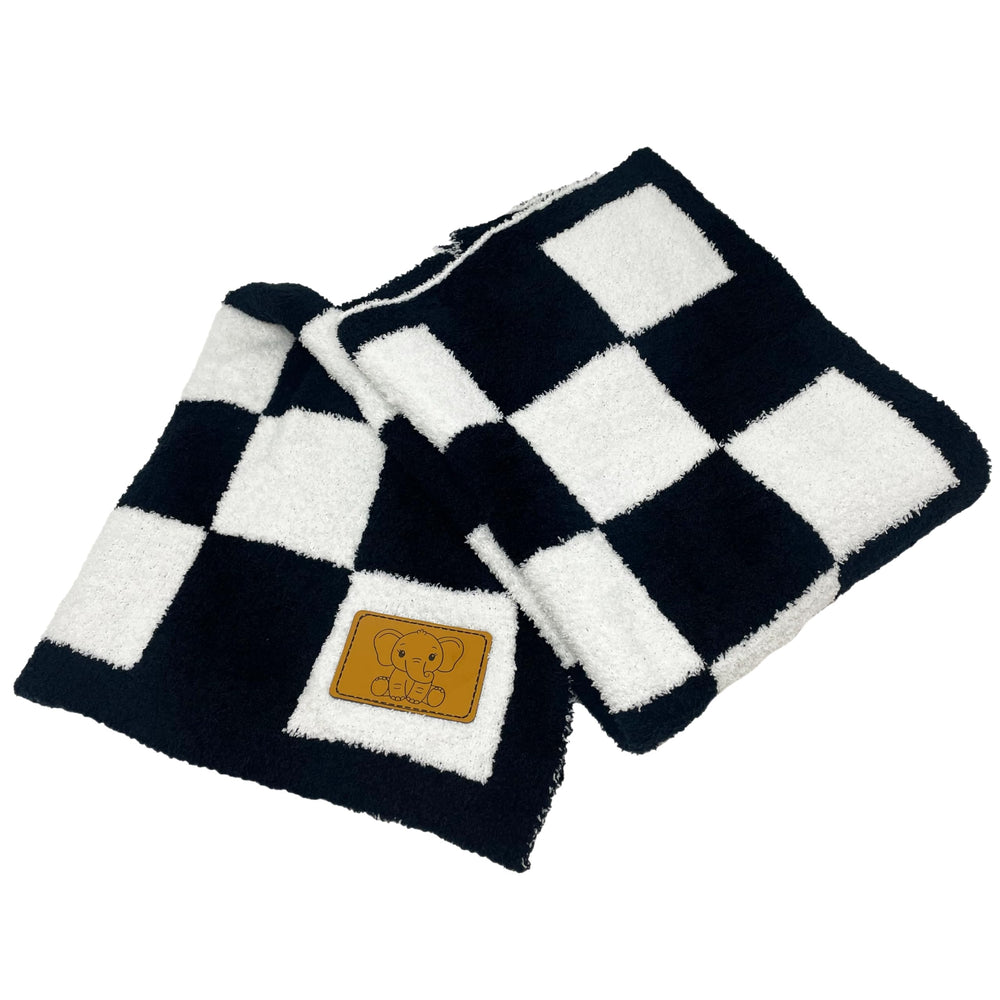 Leaps + Legends checkered blanket milestone-photos backdrop enhances baby memory captures