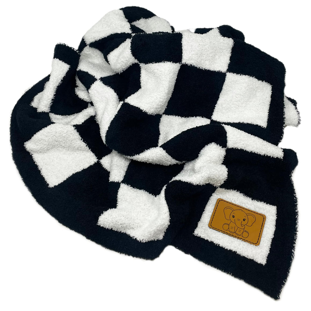 Leaps + Legends checkered blanket machine-washable design simplifies after mess cleanup