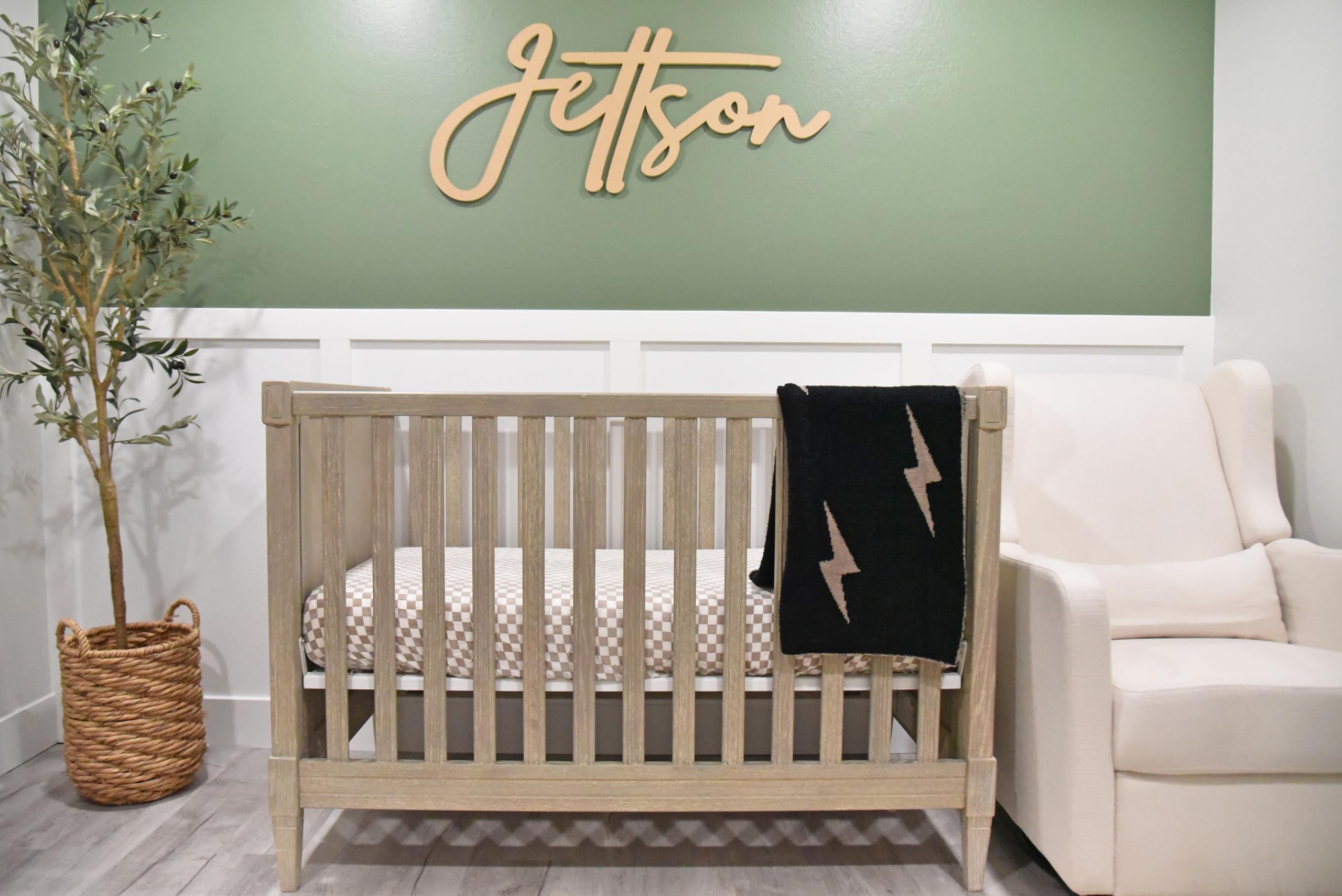 Leaps + Legends Lightning Bolt Blanket in crib creates cozy nursery ambiance