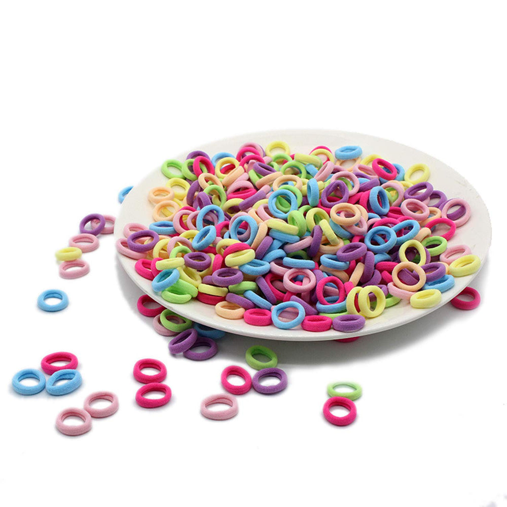 LEDUODO hair ties demonstrate secure ponytail hold for toddlers with soft stretch.