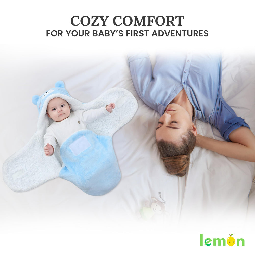 Lemon Prime swaddle with blue bear wings for adjustable cuddly fit.