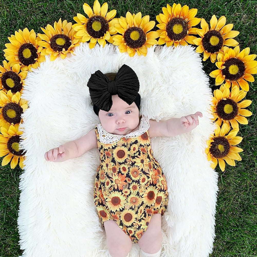 LemonSpace headbands black bow worn on baby for everyday wear