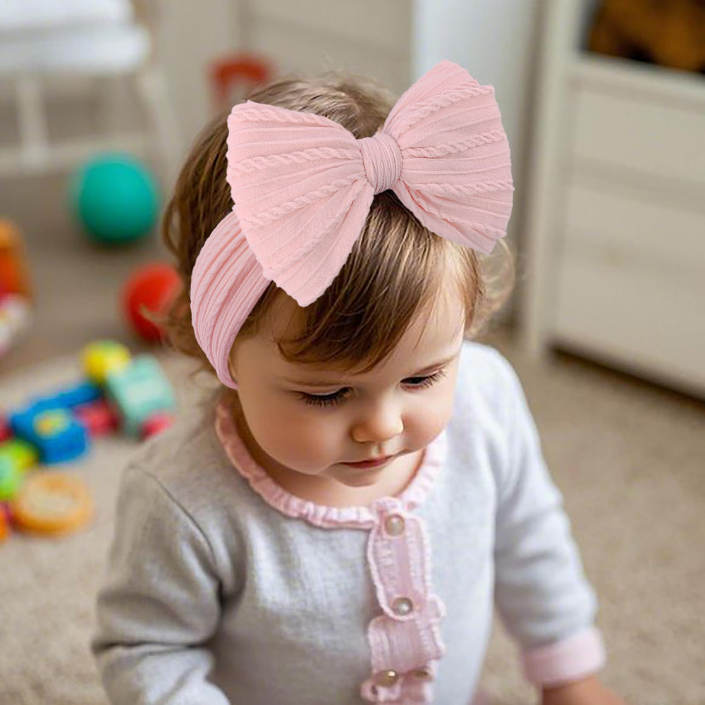 LemonSpace headbands for photoshoots; adorable baby portrait accessory.