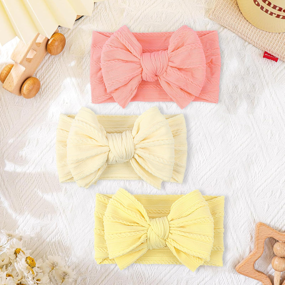 LemonSpace knot-design bow adds cute accent without leaving marks on the head.