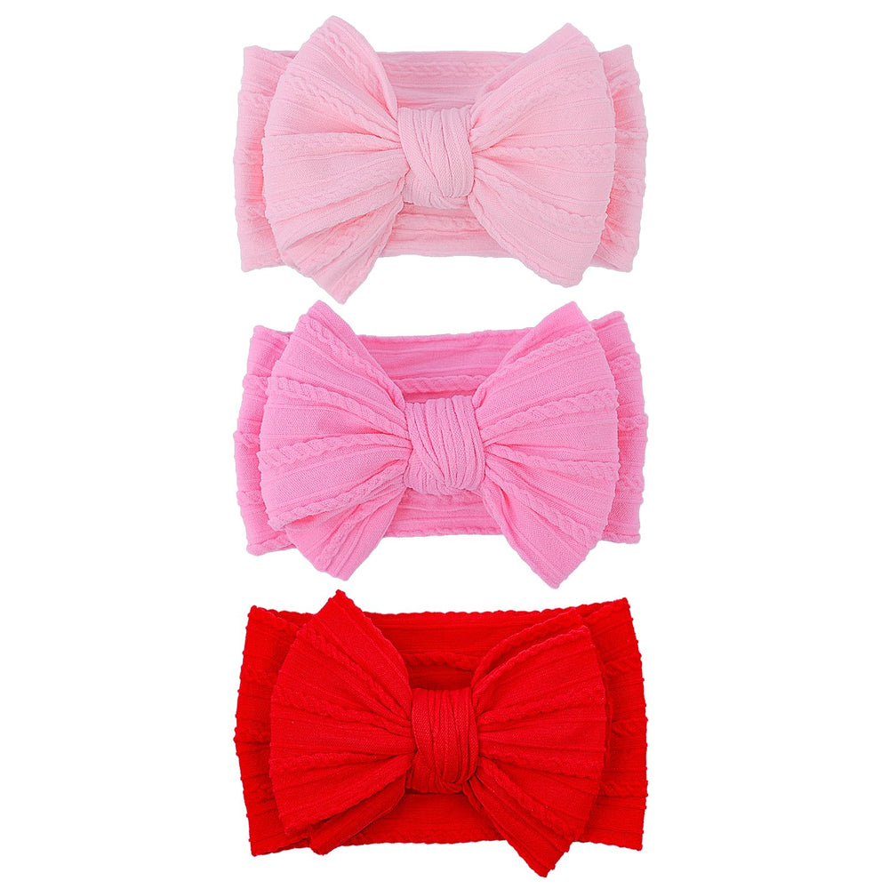 LemonSpace red baby bow headband front view shows soft stretch nylon for all-day comfort.