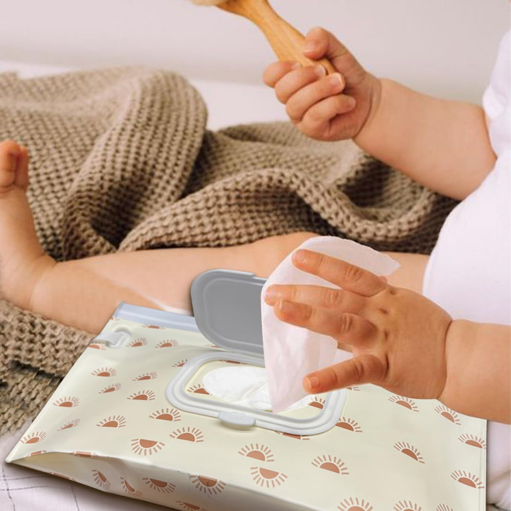 Lethooly wipe holder in use on a stroller showing portable design