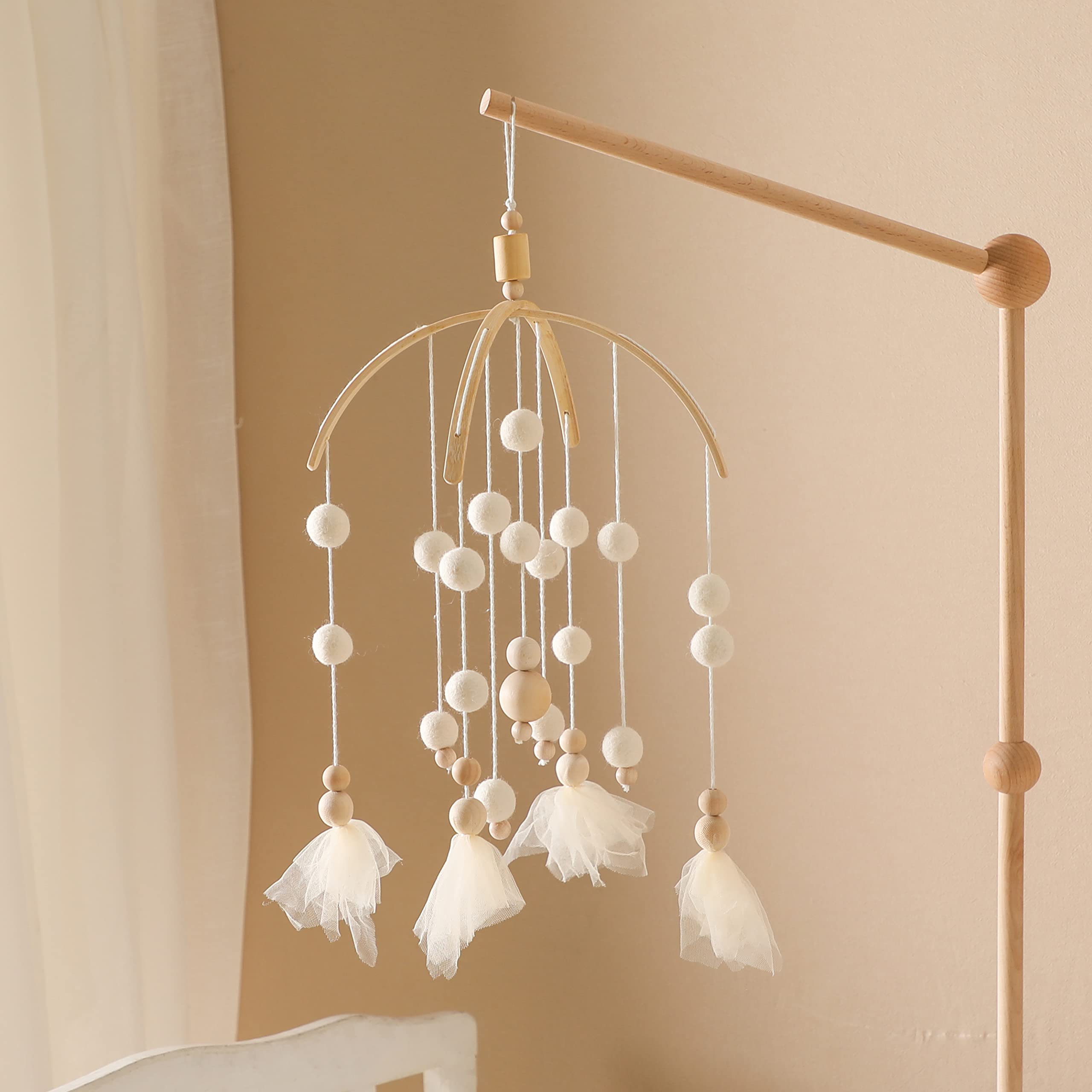 Lets Make baby mobile wooden wind chime enhances nursery decor with subtle tones.