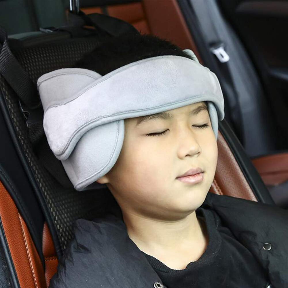 LETTON car head support gray in use with child on car seat supports posture.