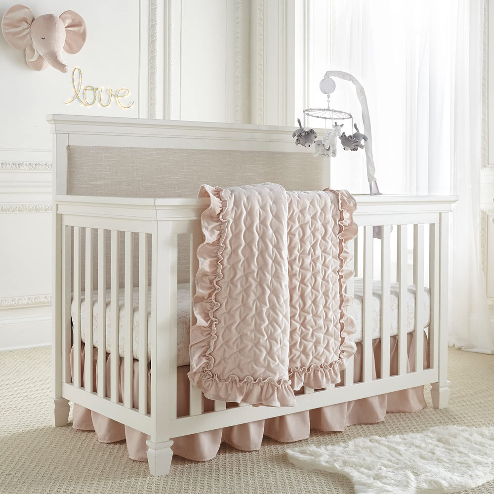 Levtex Baby Heritage quilt blush velvet texture adds luxurious focal point to crib