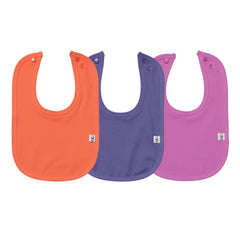 Leya & Lior StayDri bib flatlay tropical colors showing fast-drying fabric