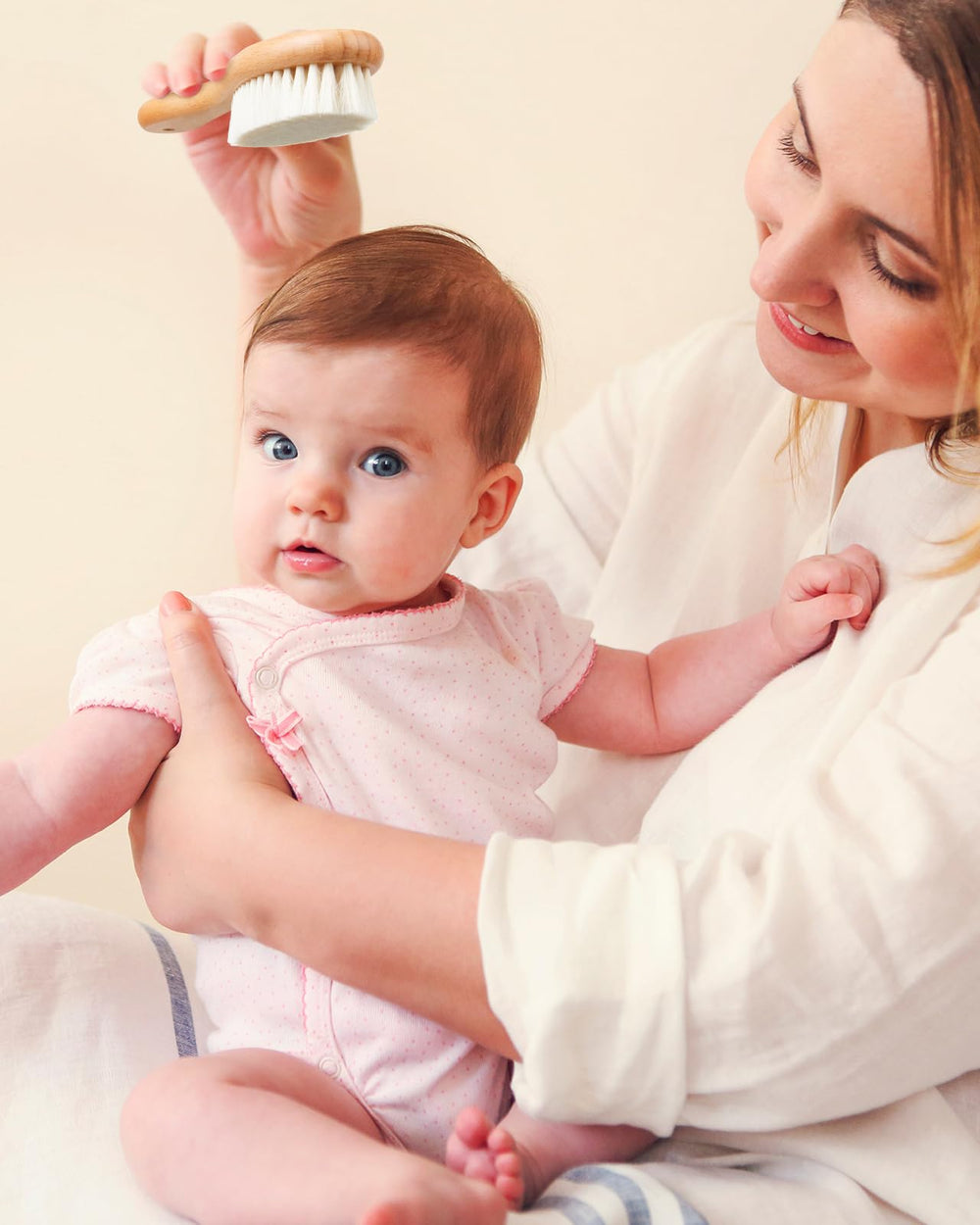 Lictin baby hair brush in a sleep scene promoting calm routine.