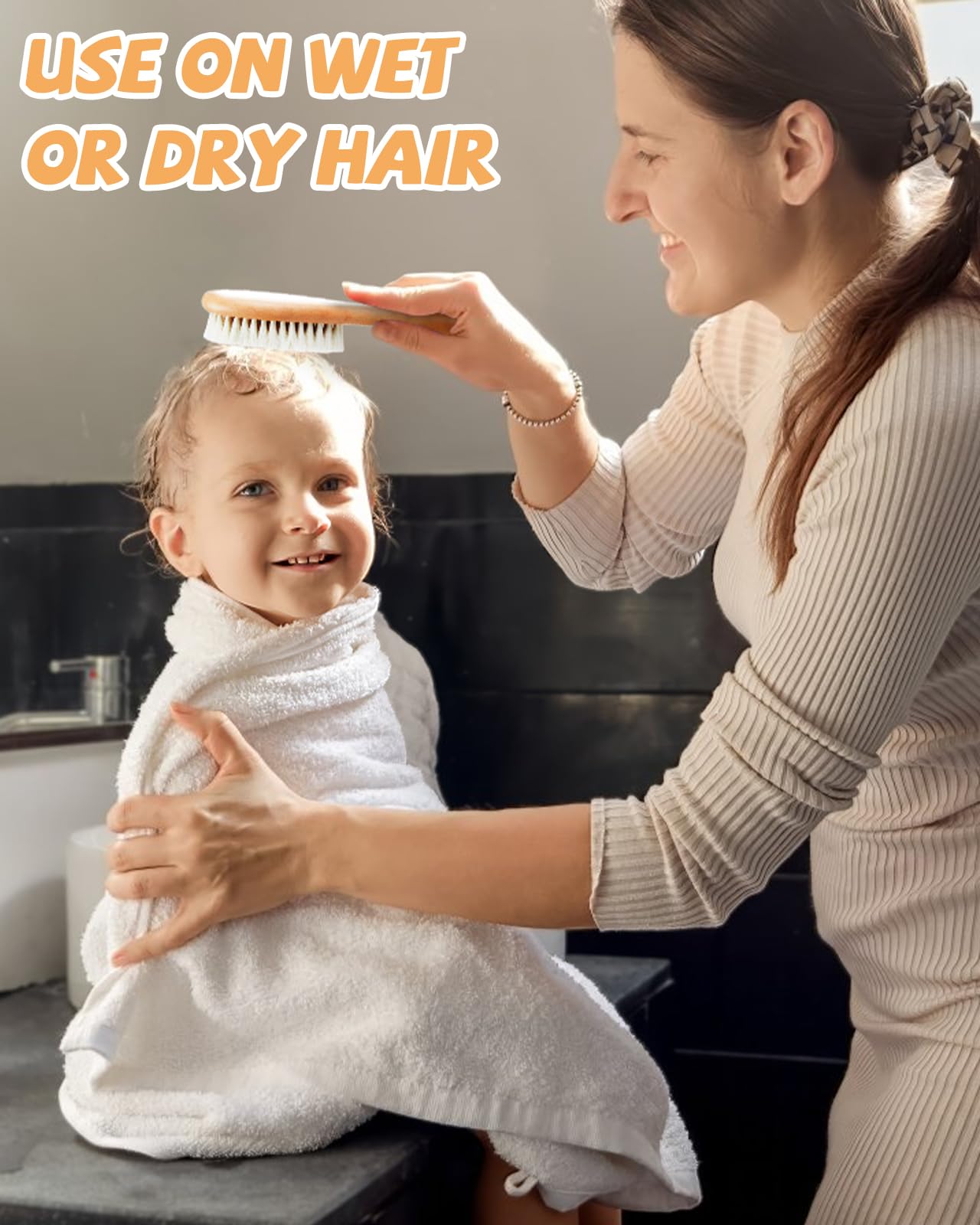 Lictin baby hair brush scalp massage promoting relaxation.
