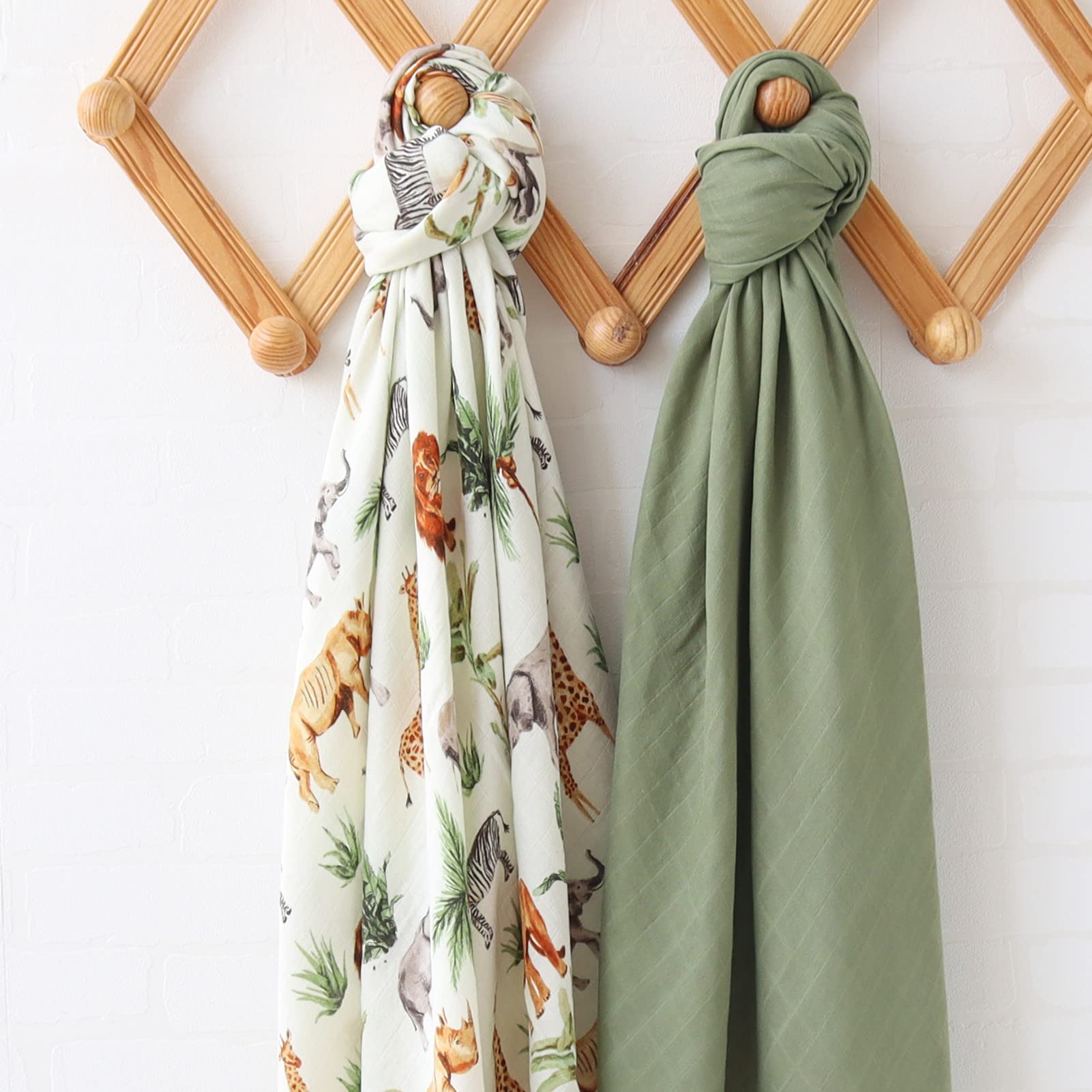 LifeTree swaddle used as nursing cover during a calm moment.