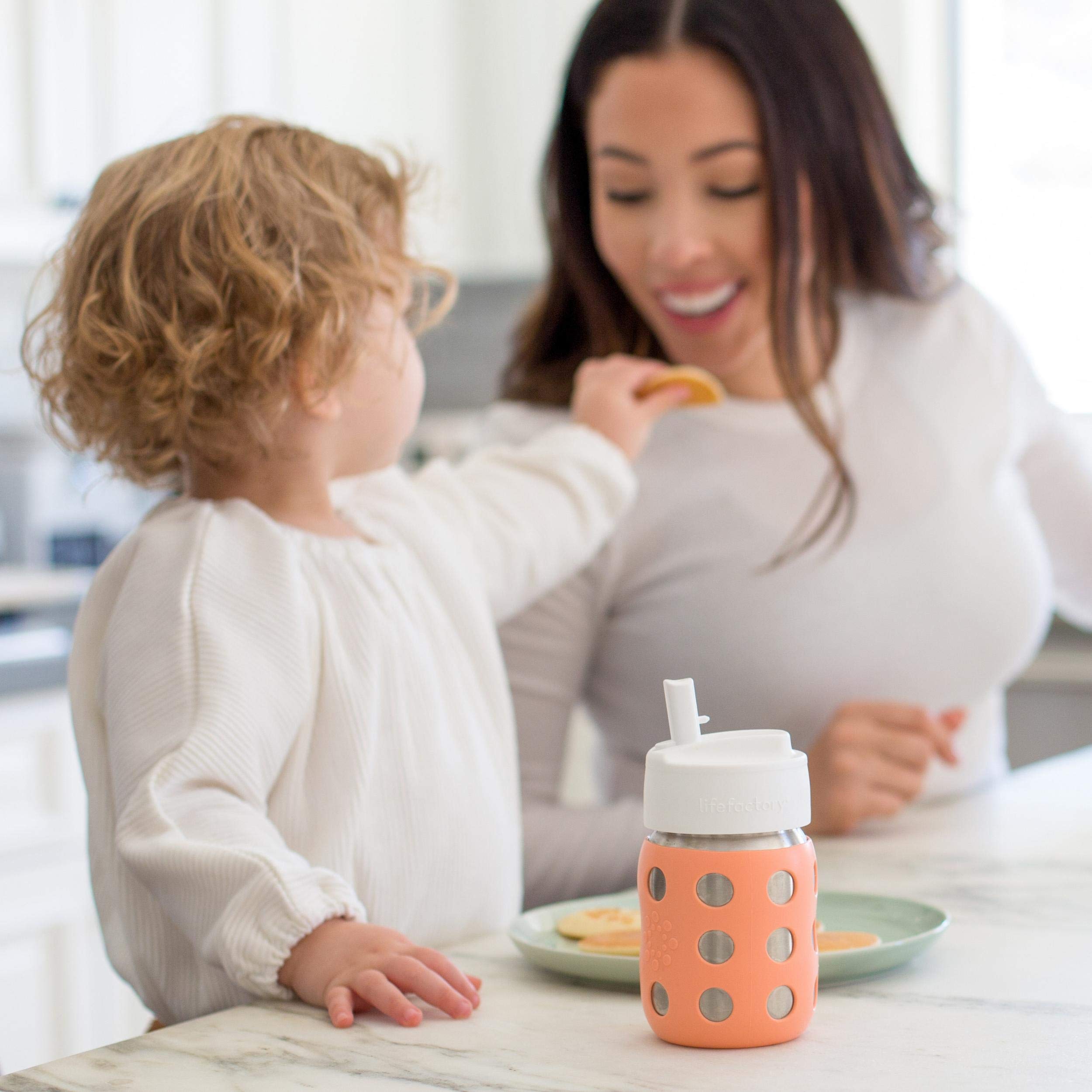 Lifefactory 8oz wide-mouth baby bottle with Pivot Straw Cap, easy to clean.