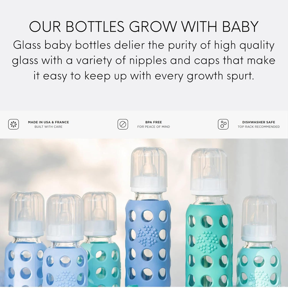 Lifefactory pink bottle in hand for on-the-go feeding