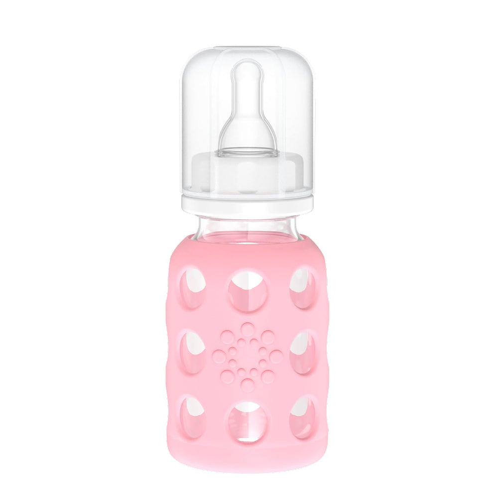 Lifefactory pink bottle with silicone sleeve offers a secure grip for feeding sessions.