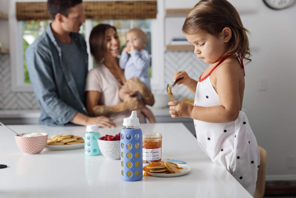 Lifefactory flat cap and sippy cap set with Stage 3 nipples enables versatile feeding options.