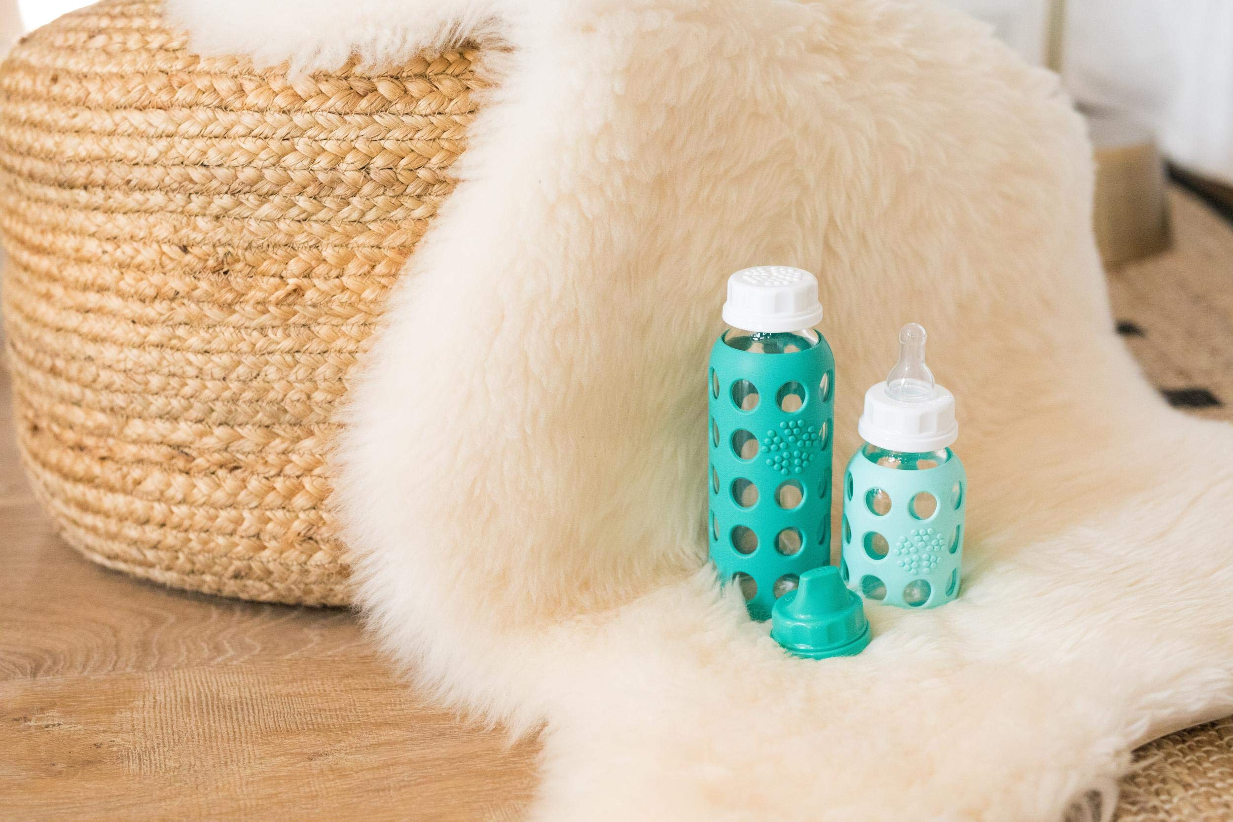 Lifefactory silicone sleeve grip protects the bottle and cushions drops for toddlers.