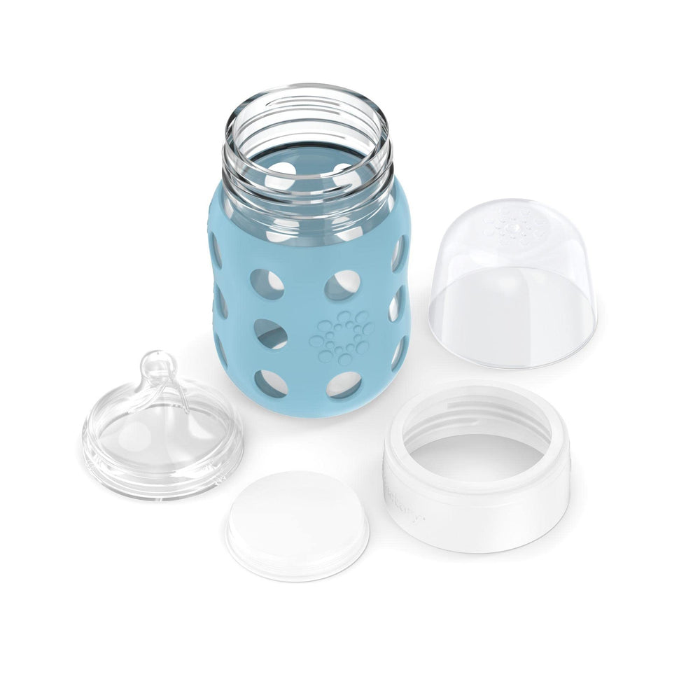 Lifefactory silicone sleeve protects glass and provides non-slip grip.