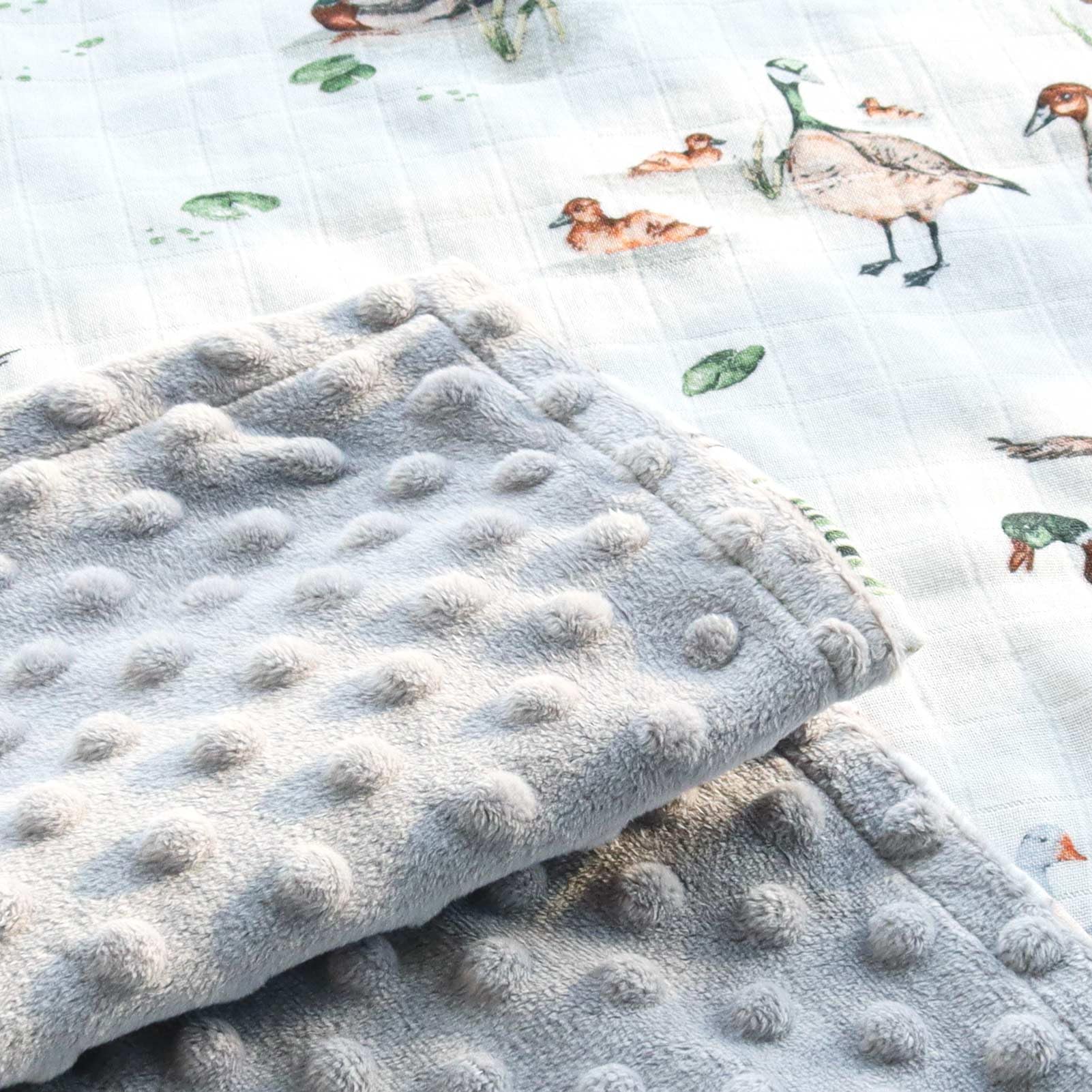 LifeTree blanket folded for travel demonstrates compact storage and quick baby comfort.