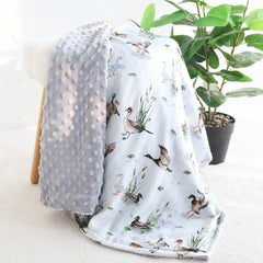 LifeTree blanket tucked in a stroller demonstrates cozy, on-the-go warmth.