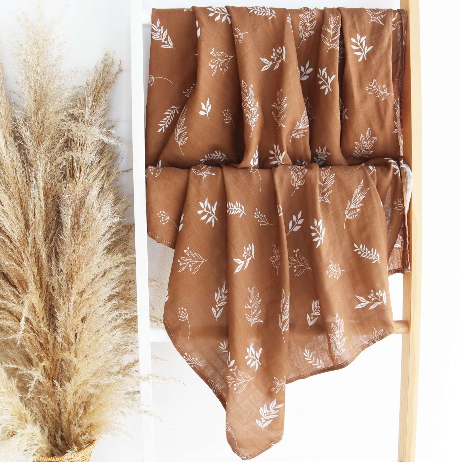 LifeTree blanket used as changing pad or nursing cover demonstrates multi-use practicality.