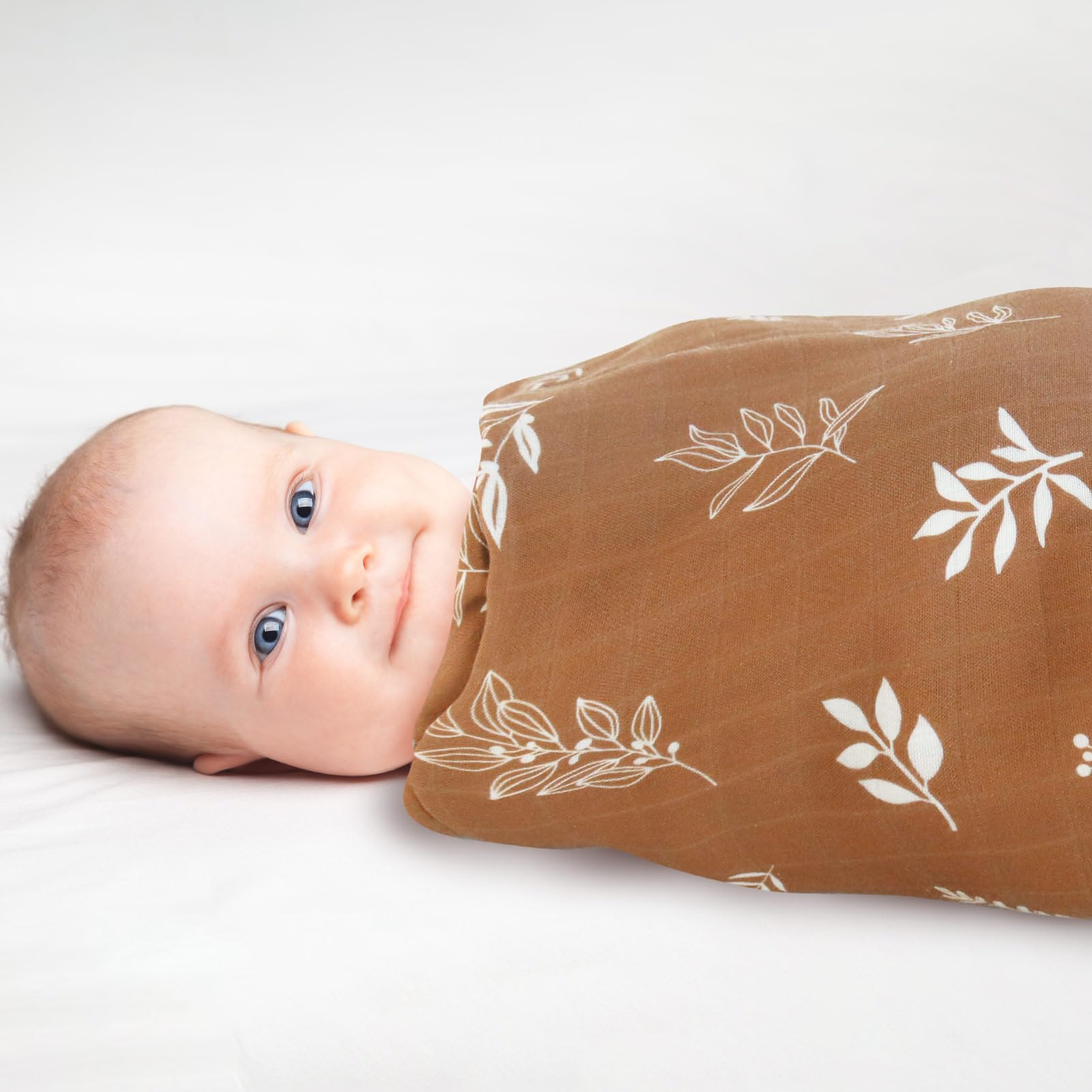 LifeTree swaddle used as stroller cover to shield baby from breeze.