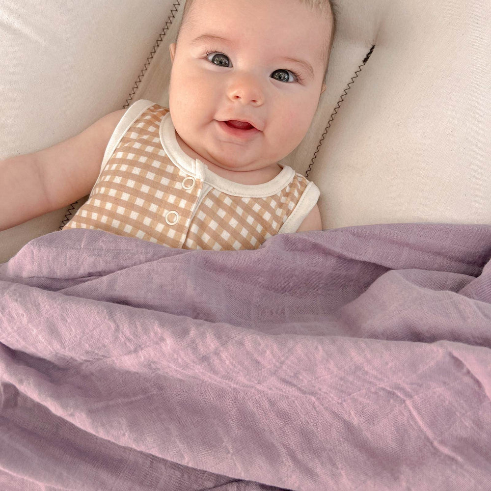 LifeTree large 47x47 swaddle supports easy newborn wrapping.