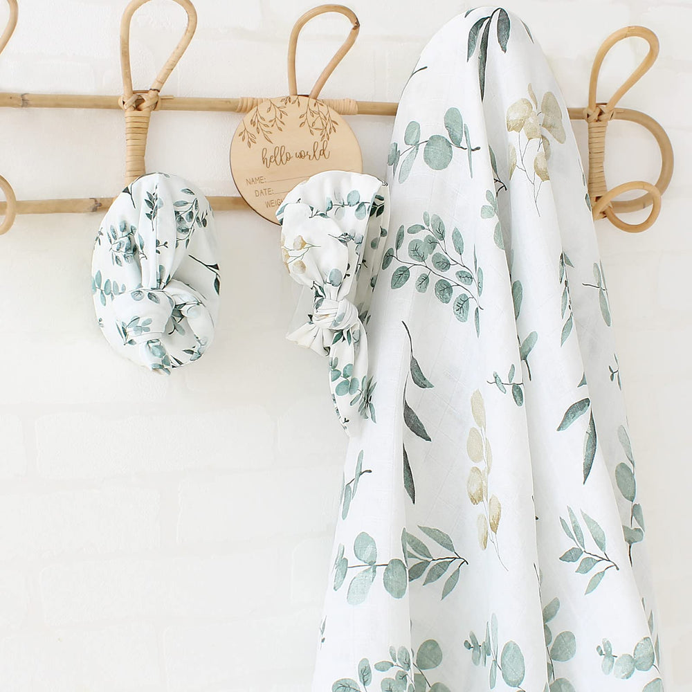 LifeTree multi-use swaddle doubles as nursing cover and stroller shield.