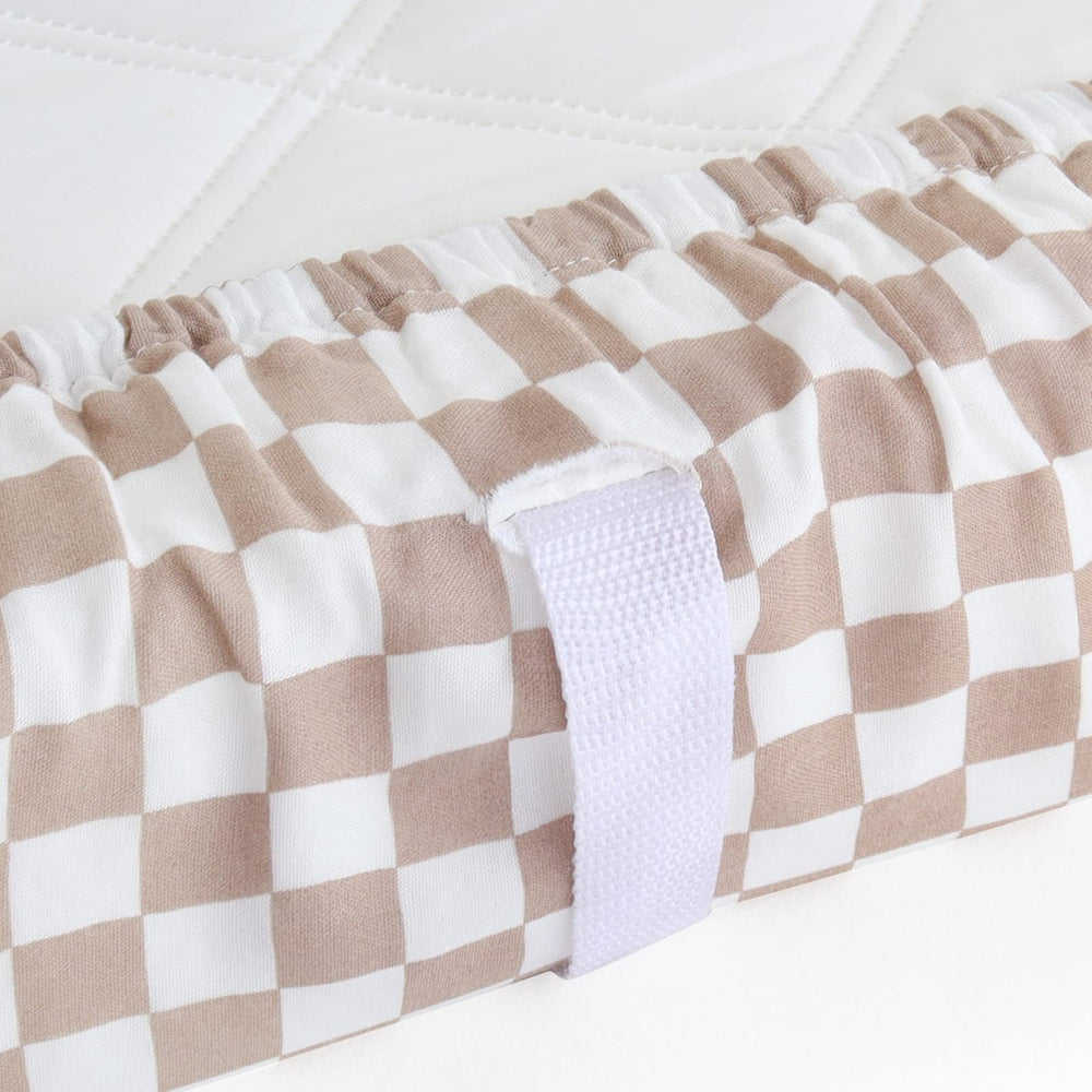 LifeTree muslin changing pad cover in use during diaper change