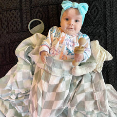 LifeTree muslin swaddle 47x47 inches offers secure newborn wrapping space