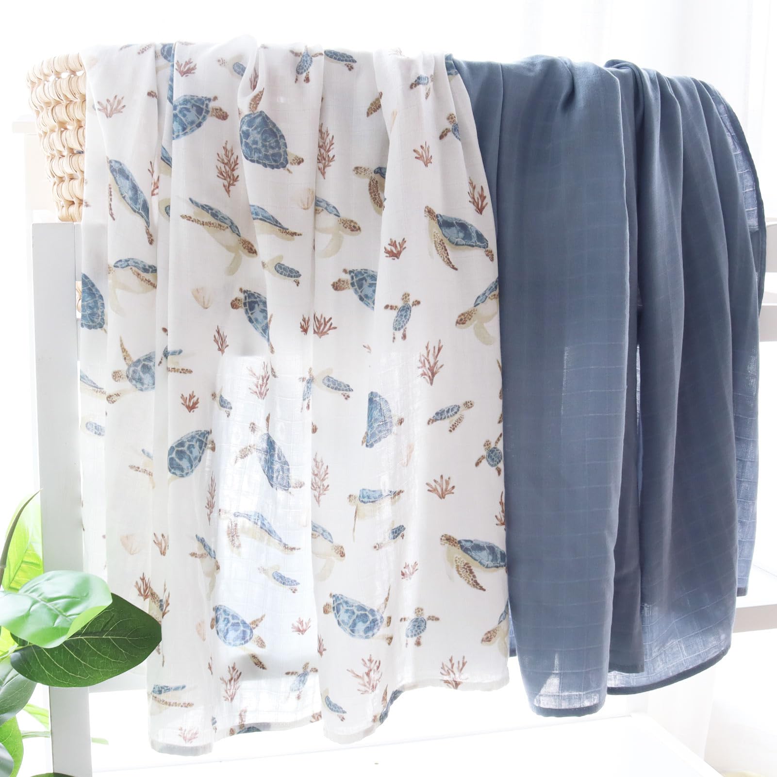 LifeTree muslin swaddle baby wrapped sea turtle highlights secure, comfortable wrap.