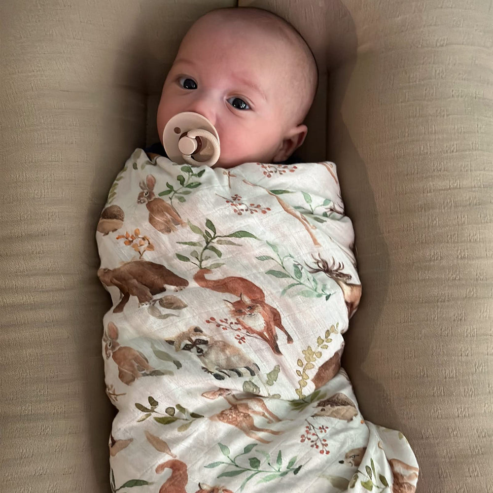 LifeTree muslin swaddle baby wrapped for secure, cozy sleep.