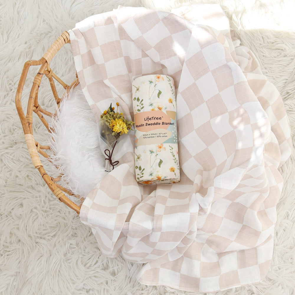 LifeTree Muslin Swaddle Blanket used as crib sheet; cozy nursery layer