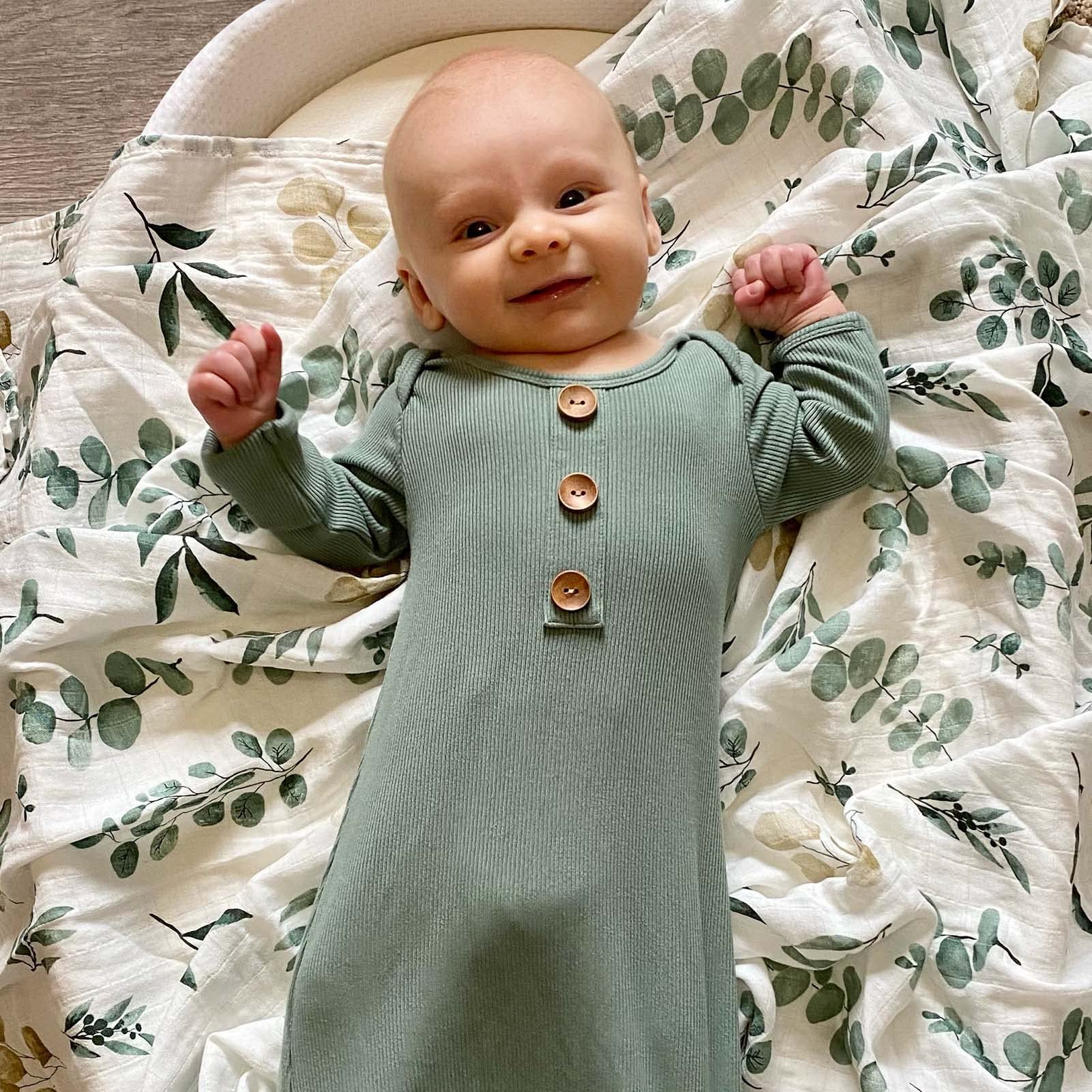 LifeTree muslin swaddle blanket in sage color for versatile baby comfort.