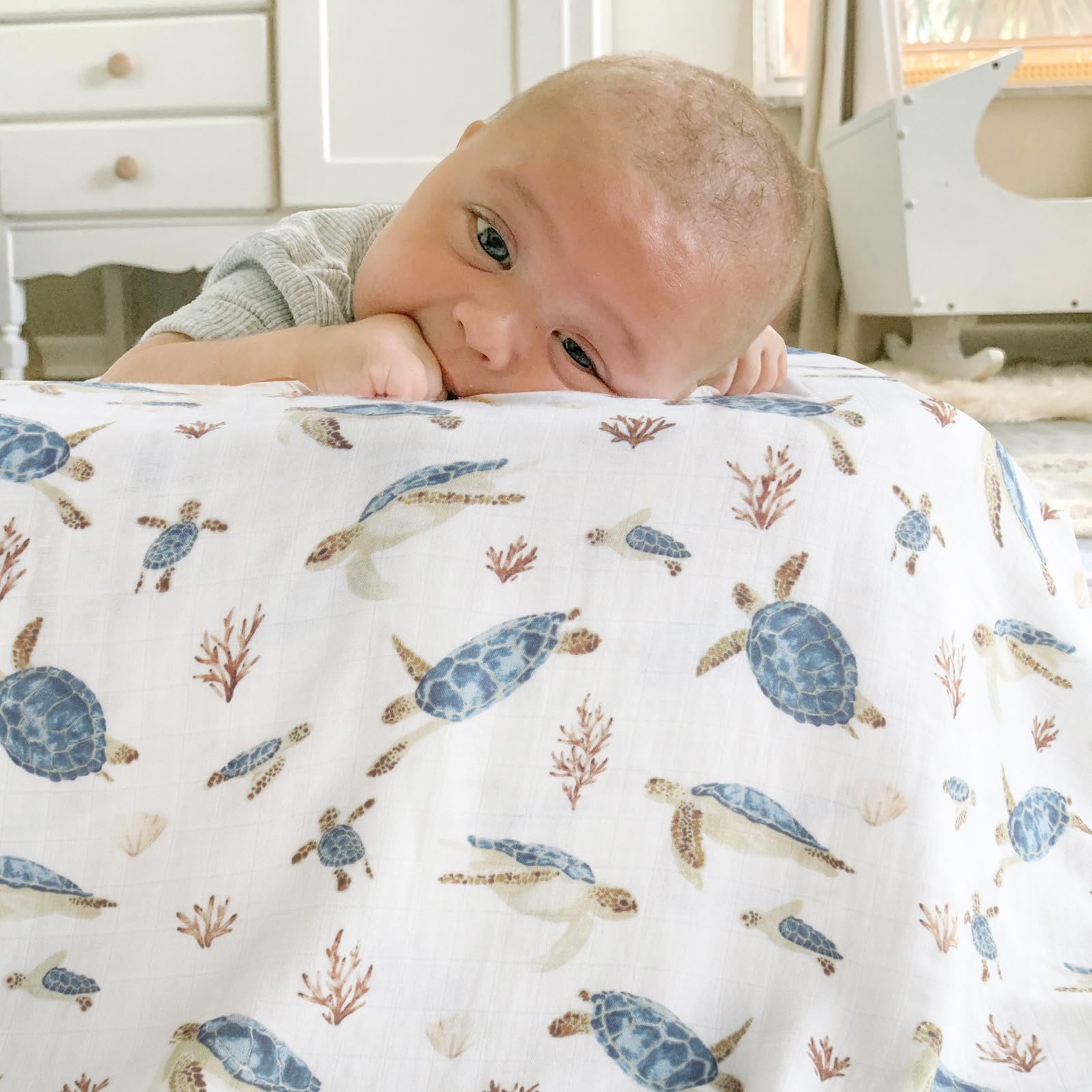 LifeTree muslin swaddle coral pattern shows gentle fabric ideal for daily swaddling.