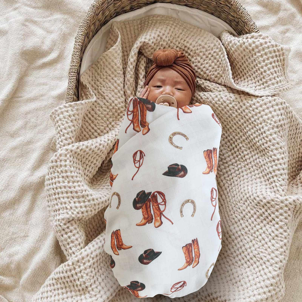 LifeTree muslin swaddle blanket nursery decor shot showcases western theme for styled baby spaces