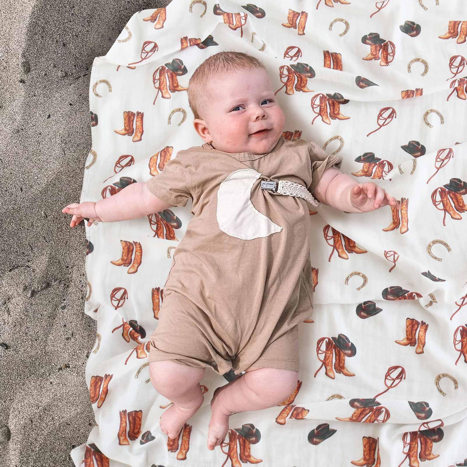 LifeTree muslin swaddle blanket western hat design highlights airy weave for gentle sleep support
