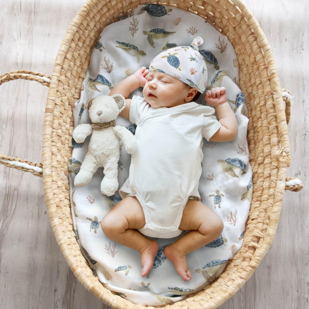 LifeTree swaddle blanket in stroller-cover pose demonstrates versatility.