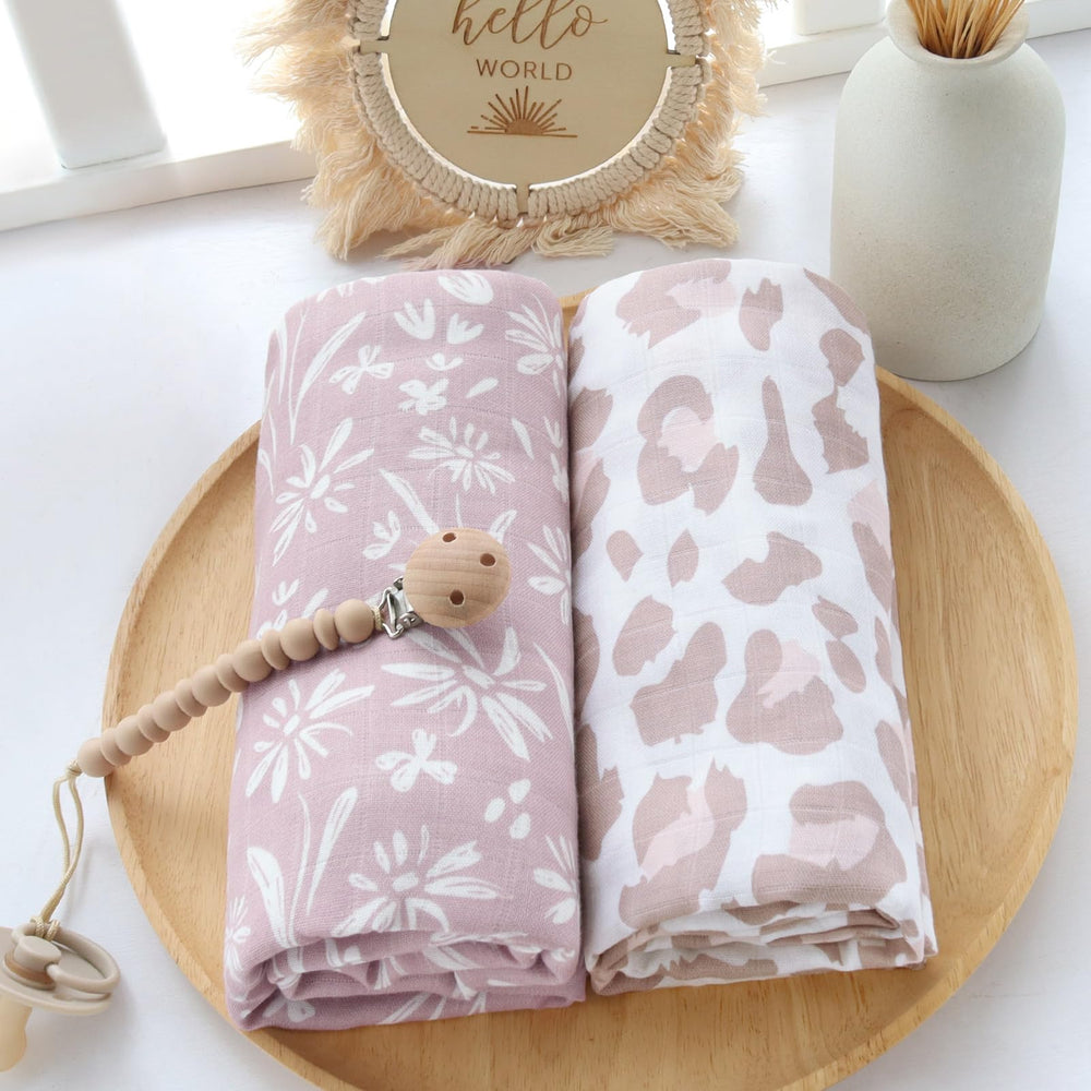 LifeTree mauve floral pattern swaddle complements nursery decor.