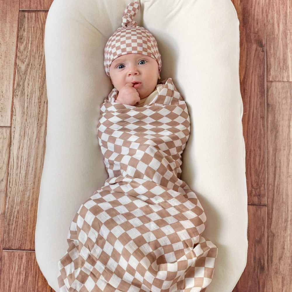 LifeTree swaddle used as hospital prop and newborn blanket for comfort.